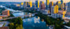 Austin Texas USA sunrise skyline cityscape over Town Lake or Lady Bird Lake with a reflection of city skyscrapers.